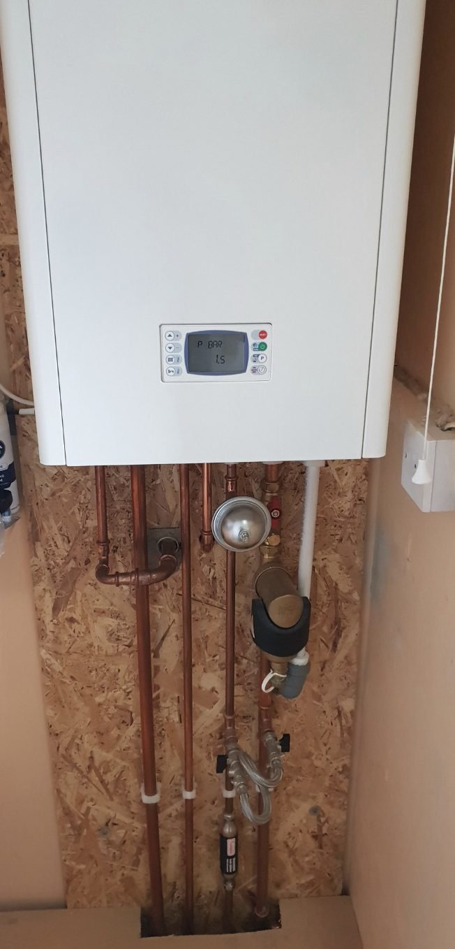 Boiler pipework and pressure gauge checked by Plumbers To Your Door Barnsley